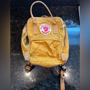 Fjällräven Kånken Mini backpack in yellow ochre